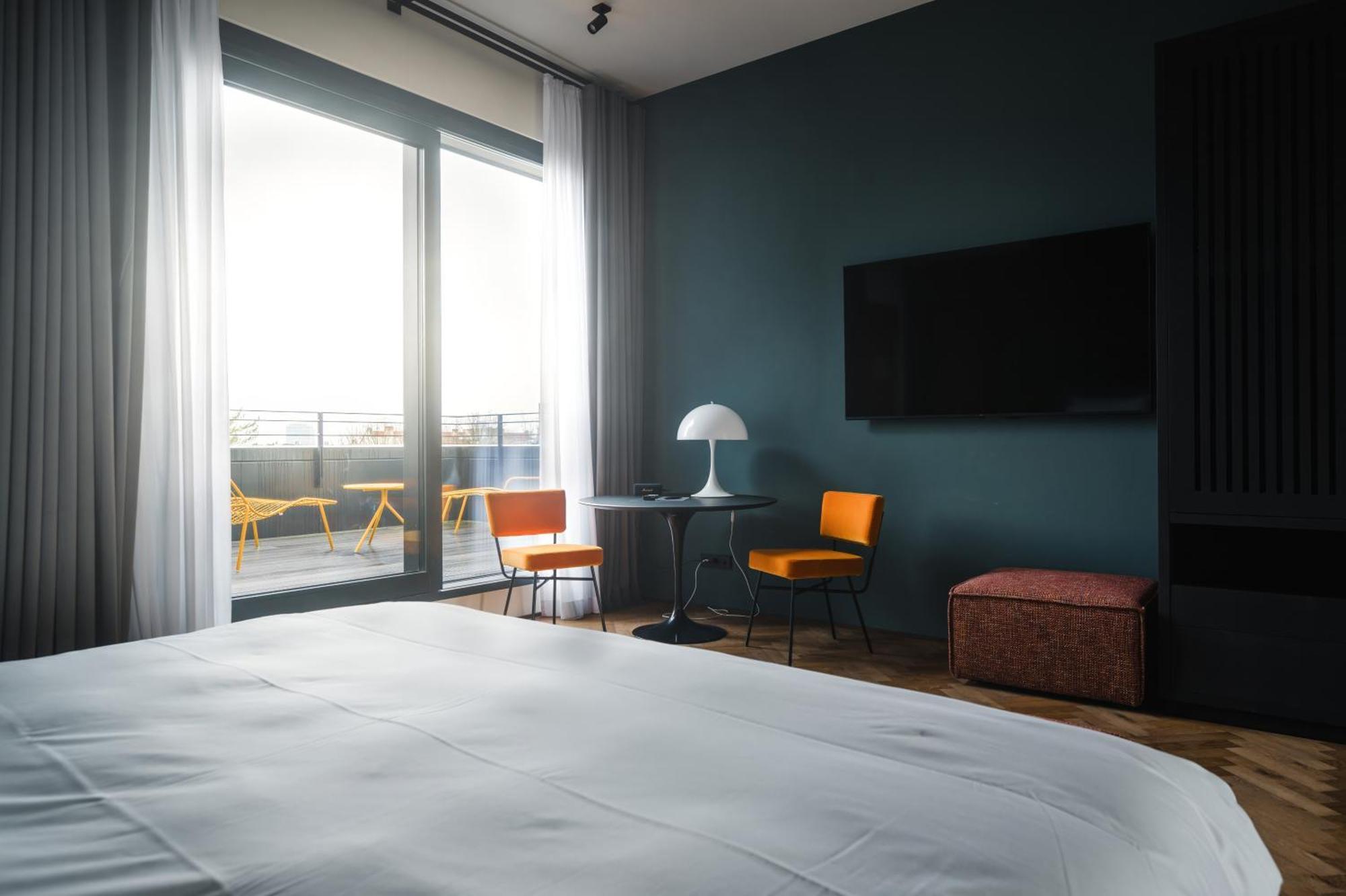 Sly Berlin Hotel ภายนอก รูปภาพ A room at the hotel